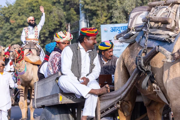 stock image Bikaner, Rajasthan, India - January 13 2023: Camel Festival, Portrait of an young rajasthani male with beard and moustache wearing white traditional rajasthani dress and turban.