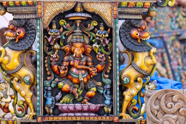 stock image Lord Ganesha sculpture made with wood piece in Surajkund Craft Fair, Faridabad, India, February 2020