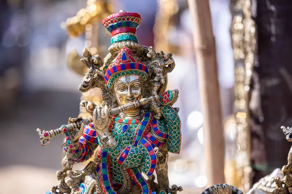 stock image Brass metal art, Handmade Indian cultural sculpture souvenir made with brass with plain background. Selective focus.