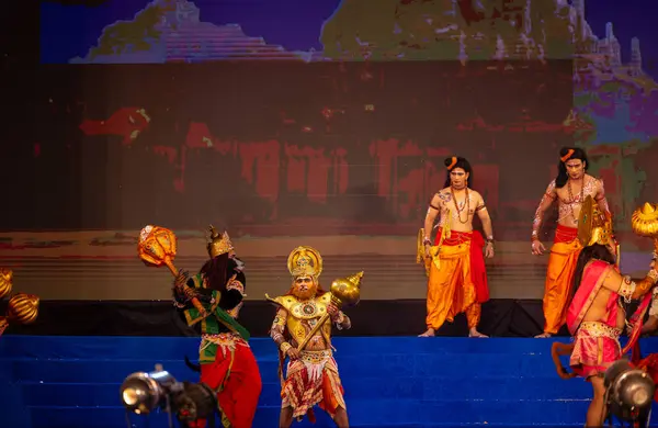 stock image Ghaziabad, Uttar Pradesh, India - October 23 2023 : Portrait of male artists playing character of hindu god hanuman in a fighting scene with devil of ramayana in ramlila during the dussehra festival