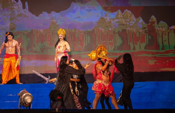 stock image Ghaziabad, Uttar Pradesh, India - October 23 2023 : Portrait of male artists playing character of hindu god hanuman in a fighting scene with devil of ramayana in ramlila during the dussehra festival