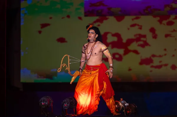 stock image Ghaziabad, Uttar Pradesh, India - October 23 2023 : Male artist playing character of hindu god laxman with his arrow bow character of ramayana in ramlila during the dussehra festival.