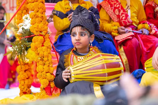 stock image Ghaziabad, Uttar Pradesh, India - January 28 2024: Portrait of beautiful young kids dresses as hindu gods during the rath yatra organised by iskon group for lord jagannath.