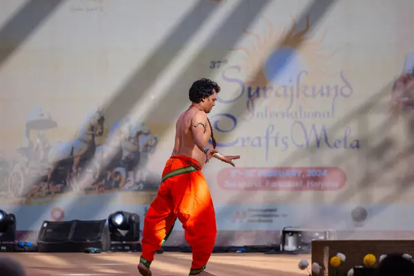 stock image Faridabad, Haryana, India - February 17 2024: Portrait of male south indian artist performing classical dance kuchipudi on stage at surajkund craft fair.
