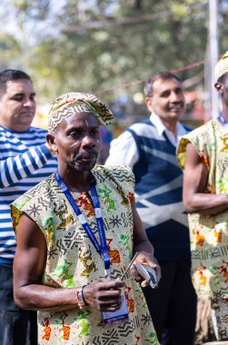 Faridabad, Haryana, India - February 17 2024: Artist from african country participating in surajkund craft fair to perform their cultural dance to entertain tourists.
