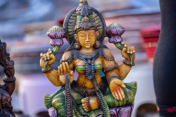 stock image A handmade wooden idol of Goddess Laxmi sounds like a beautiful tribute to the deity's revered presence in Hindu mythology and culture.