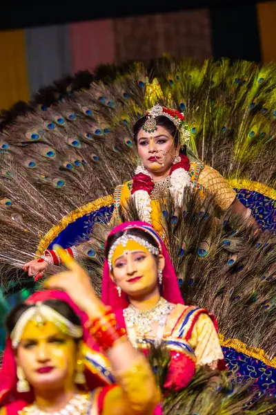 stock image Ghaziabad, Uttar Pradesh, India - March 17, 2024: Portrait of young female artists playing phoolo ki holi during holi festival in colourful ethnic clothes.