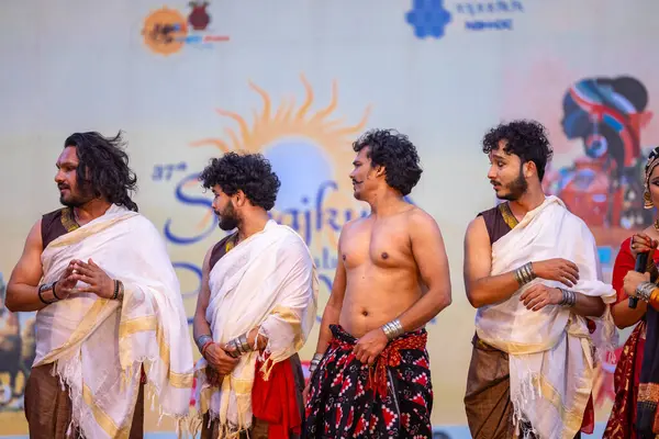 stock image Faridabad, Haryana, India - February 17 2024: Group of south indian artists receiving gesture post their performance of classical dance kuchipudi during surajkund crafts fair.