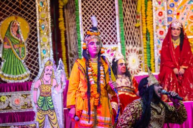 Ghaziabad, Uttar Pradesh, India - October 20, 2023: Portrait of the Indian artists playing characters of Hindu holy book Ramayana in Ramlila during the Dussehra festival. clipart