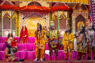 Ghaziabad, Uttar Pradesh, India - October 20, 2023: Portrait of the Indian artists playing characters of Hindu holy book Ramayana in Ramlila during the Dussehra festival. clipart