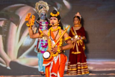 artists playing characters of ramayana in ramlila during the dussehra festival. clipart