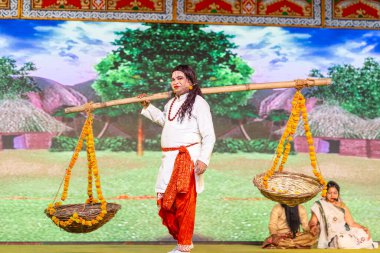 Ghaziabad, Uttar Pradesh, India: Artists playing during the dussehra festival. clipart