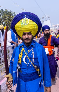 Anandpur Sahib, Punjab, India: hola mohalla festival during holi clipart