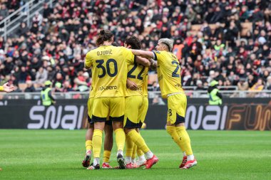 Milan, Italy. 26 Jenuary 2025. Giuseppe Meazza Stadium. Italian Serie A Championship. Milan vs Parma 3-2. Matteo Cancellieri, Parma, score the goal of 0-1 and celebrates with team-mates. clipart