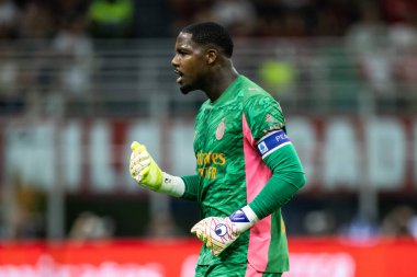 Milan, İtalya. 23 Ağustos 2025. Meazza Stadyumu. İtalyan Serisi A Futbol Şampiyonası. AC Milan, Cremonese 'e karşı. Mike Maignan, gooalkeeper Milan.