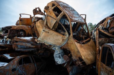 Stacked a bunch of crashed cars after fire and missiles attacks in city