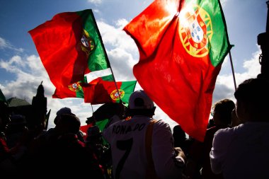 Hamburg, Germany - July 5, 2024: Portuguese fans celebrating Euro 2024 in the streets of the city clipart