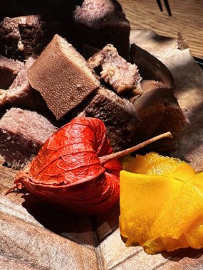 Premium Japanese beef tongue for barbecue or yakinuku, under stylish spot light.