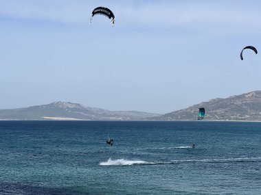 Kite surfing around Isla de Tarifa in Spain