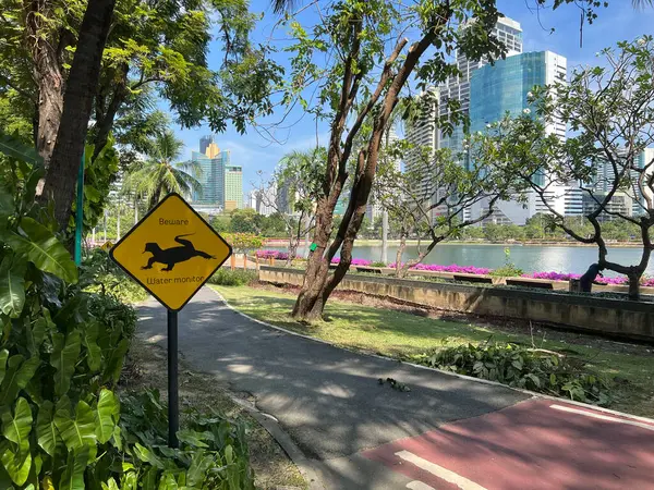 Cycle Path Warning Sign Water Monitor Benchakitti Park Bangkok Thailand — Stock Photo, Image