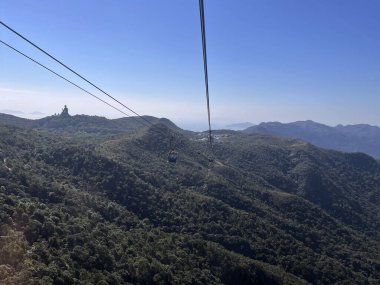 View from the Ngong Ping 360 Cable Car To the Tian Tan Buddha around Hong Kong clipart