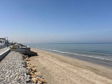 Muscat 'te halk plajında gündüz vakti Umman.