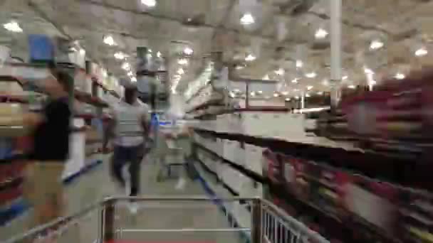 High Speed Time Lapse Shopping Cart Going Aisles Box Big — Stock Video