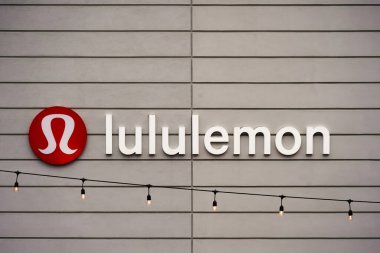 Westport, CT - April 7, 2023 : Lululemon store corporate logo with string lights
