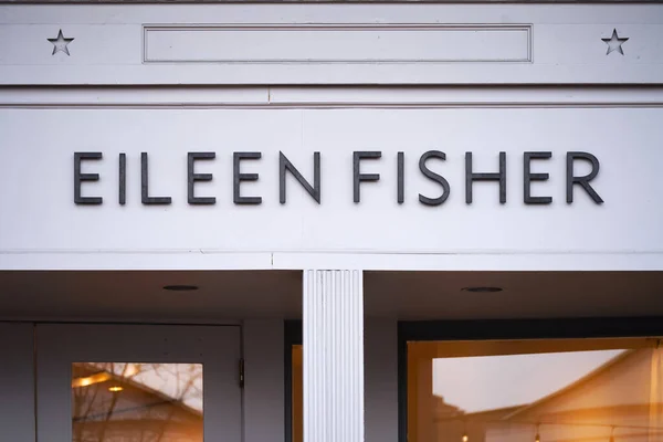 stock image Connecticut, USA - April 7, 2023 : Eileen Fisher boutique store in commercial shopping district logo sign closeup. 