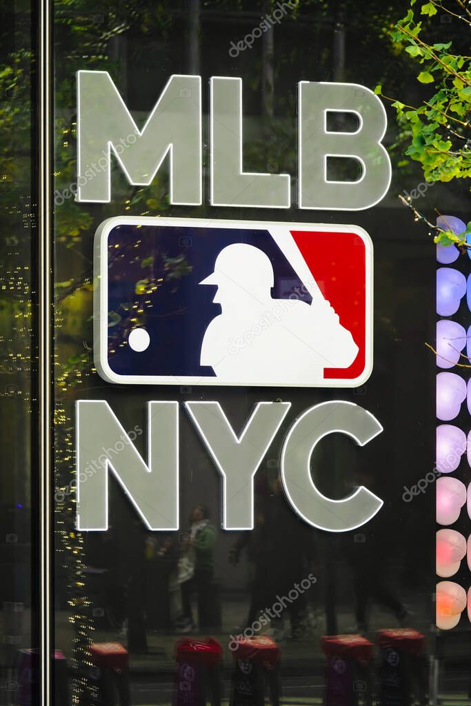 New York, NY - November 23, 2023:MLB Major League Baseball NYC flagship store in Manhattan window closeup with official logo