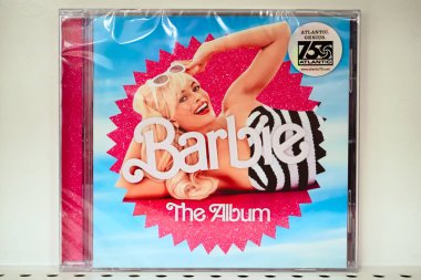 New York, NY - March 21, 2024: Barbie the Album, Barbie film soundtrack music CD cover on display at retail store.