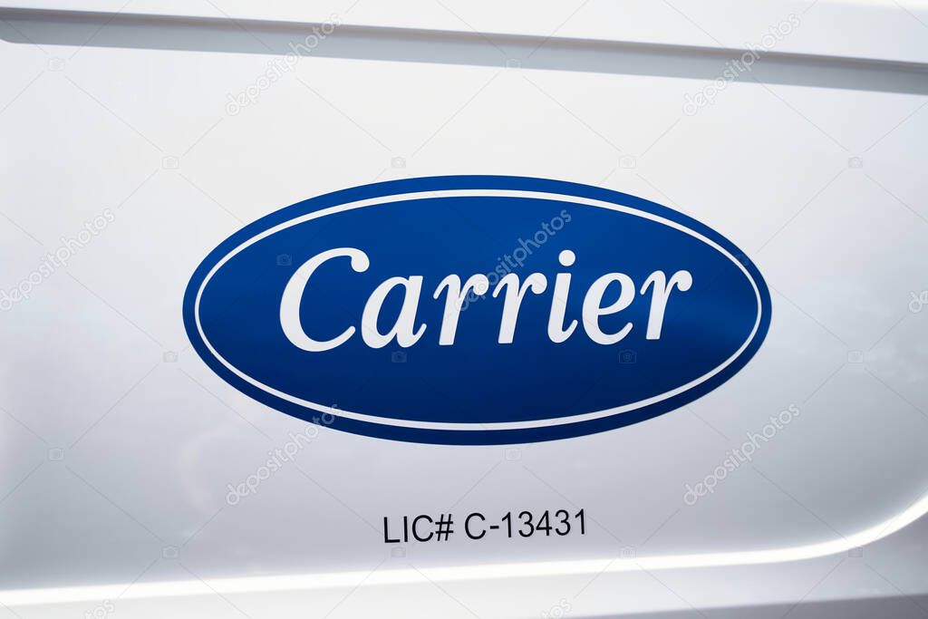 Honolulu, HI-Jan 16, 2025: Carrier Global Corporation business logo on service vehicle. Carrier offers heating, ventilation, and air conditioning (HVAC), refrigeration, and fire and security services