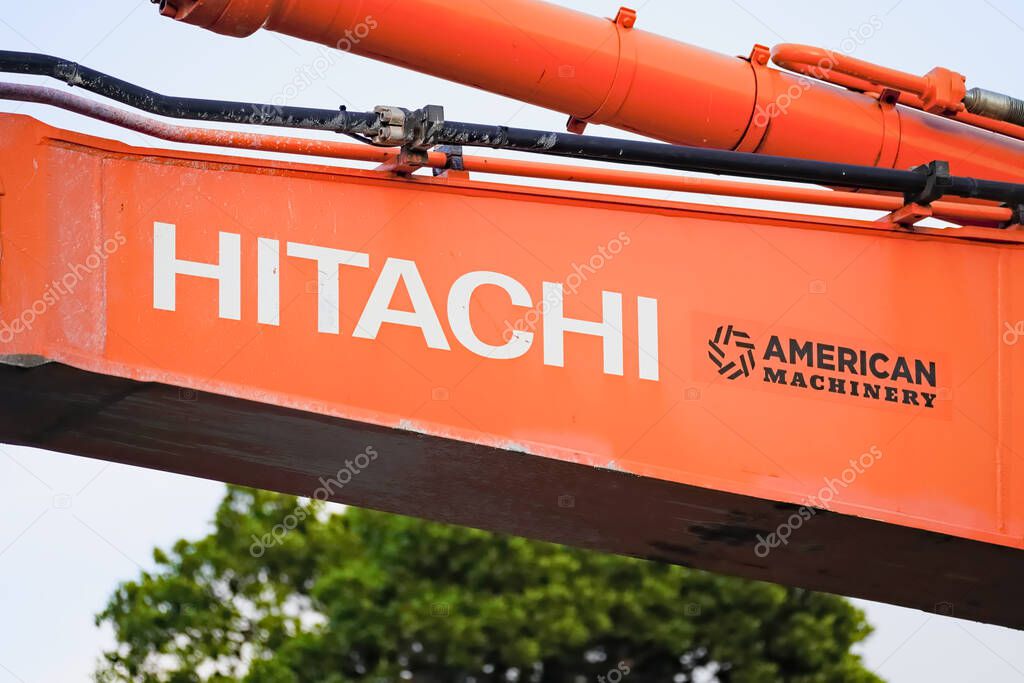 Hi, USA - Jan. 22, 2025: Hitachi American Machinery logo closeup on construction heavy equipment.