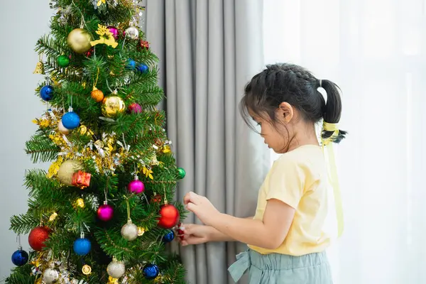 Children Kids Girl Decorating Christmas Tree Celebrate Christmas New Year Stock Photo