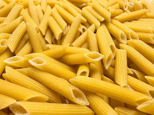 a pasta cooking food display uncooked raw penne mostaccioli organic ingredient