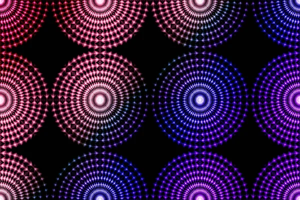 a pink purple light circles spiral pattern whirl bright shine circular lights
