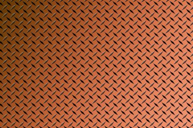 a shiny rusty diamond plate stainless steel embossed metal floor traction tread