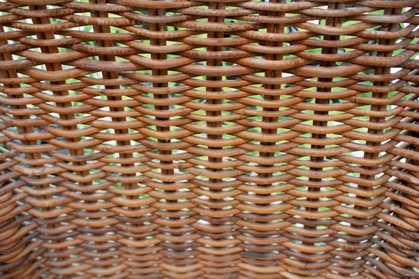 a wicker rattan basket handmade old retro cane interlaced worn twigs wickerwork