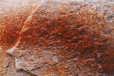 a red stone surface rock mineral building exterior industrial design material