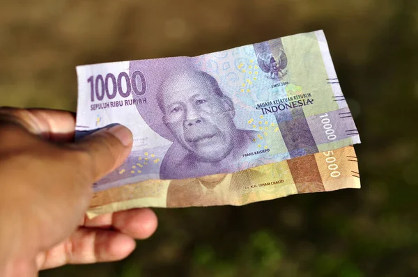Hold Indonesia Rupiah Banknote Money Trade Transaction Selective Focus — Stock Photo, Image