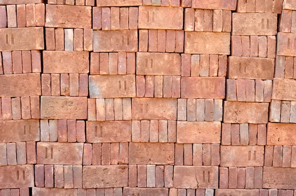 Pile of red bricks texture background