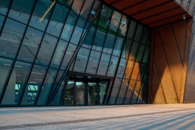 cgi backplate production.modern building illuminated with multicolored illuminations