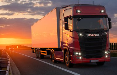 Scania S 730 truck with semi-trailer on the motorway clipart