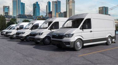Otoparkta bir sürü kargo kamyonu var.