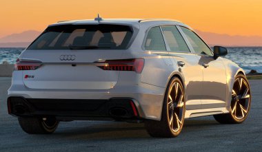 Audi RS6 Avant in a seaside parking lot clipart