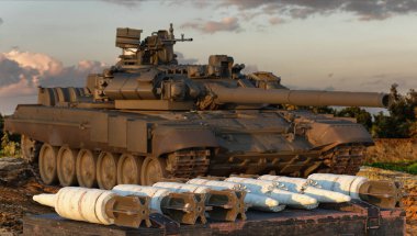 Tankın arka planındaki cephane kutusunda tank mermileri var.