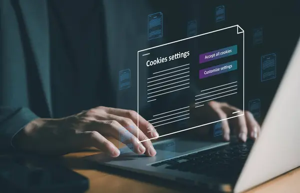 Stock image hand using laptop while choose to accept internet cookies policy or reject. Customer data privacy concept that allow web browser to collect user data to resell or use for marketing purpose.