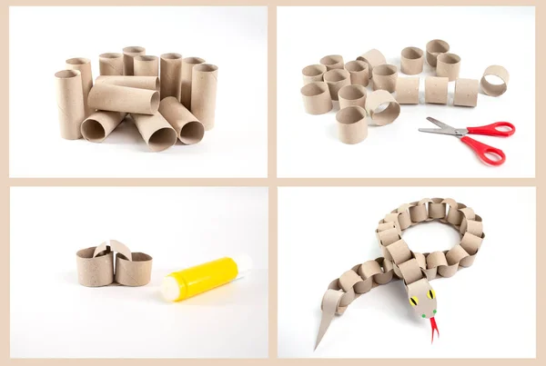 Beyaz bir yüzeyde tuvalet kağıdı rulosundan yapılmış bir yılan, geri dönüşüm kartonu, DIY, özel ders, çocuklar için eğitim sanatı, kağıt zincirli piton oyuncağı