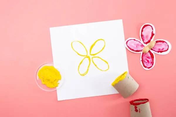 part of process making paper craft butterflies, stamp, paint tubes, recycling concept, easy craft for kids, DIY, tutorial
