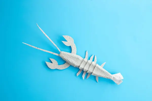 stock image Craft lobster or crayfish from an egg carton. Creative DIY project for kids and art enthusiasts. top view